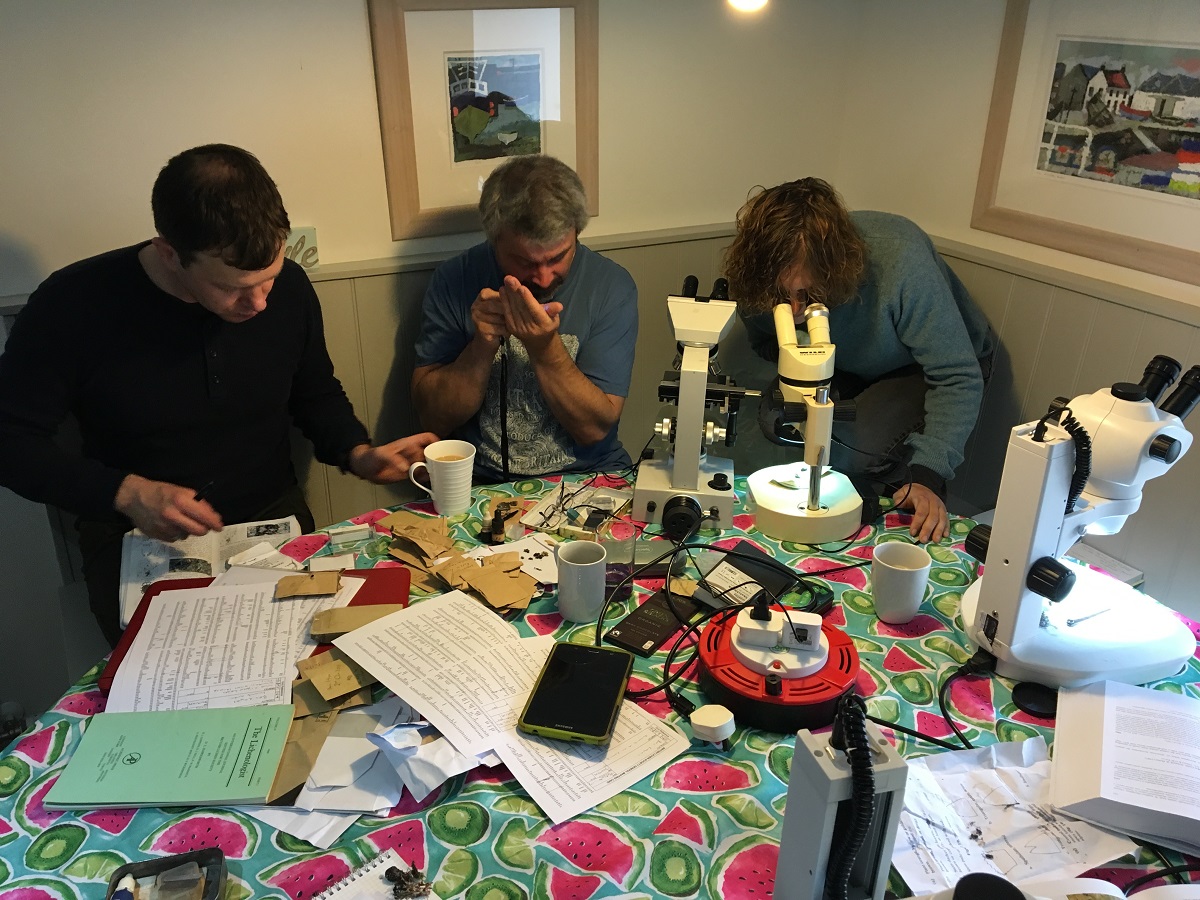 Lichen expert John Douglass supporting Joe Beale & Maddie Geddes-Barton during a microscope session - LAFF 2019 (c) April Windle