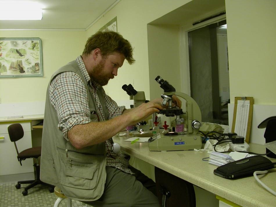Joe Hope - using microscope at Anancaun SNH Field Centre